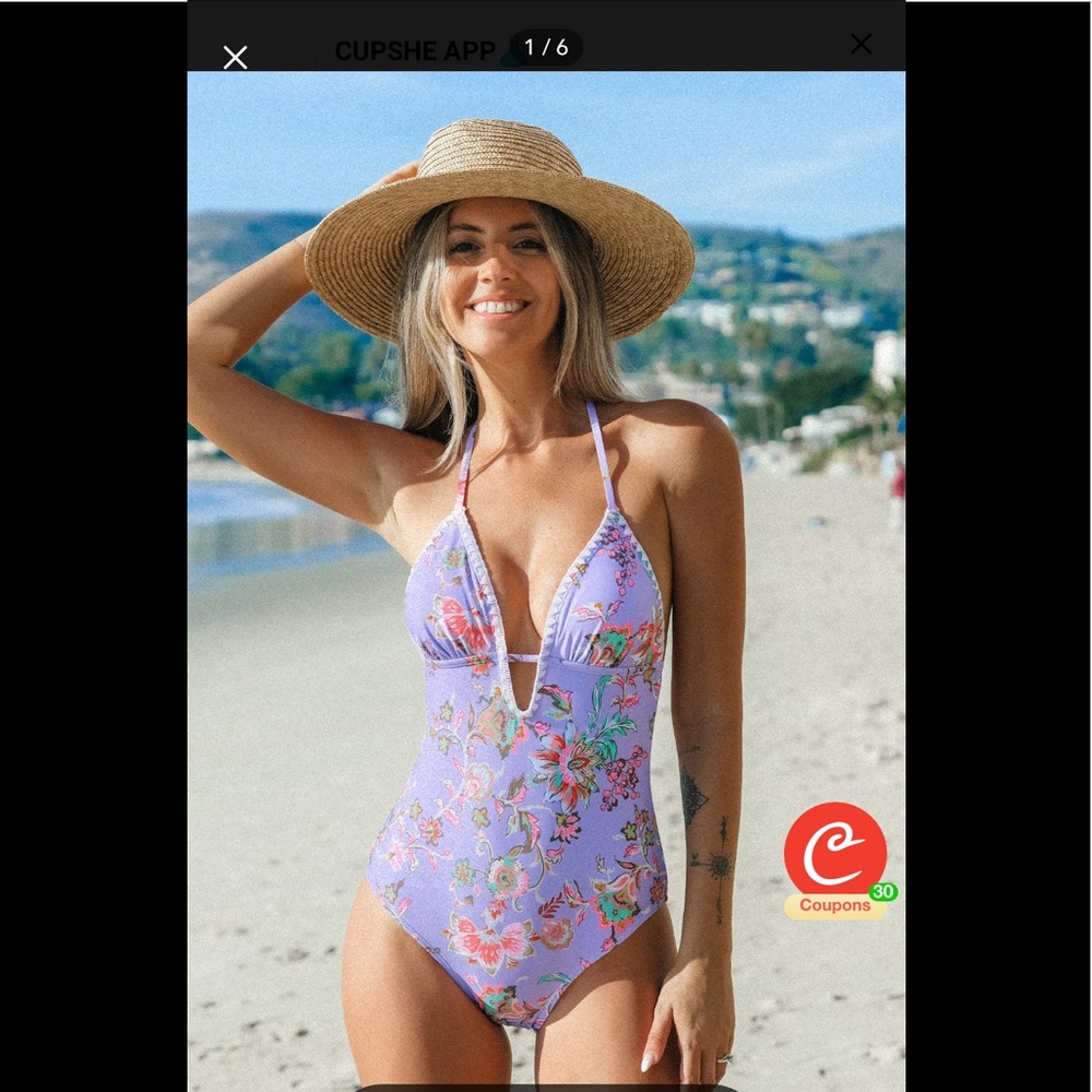 Lavender floral one-piece bathing suit.